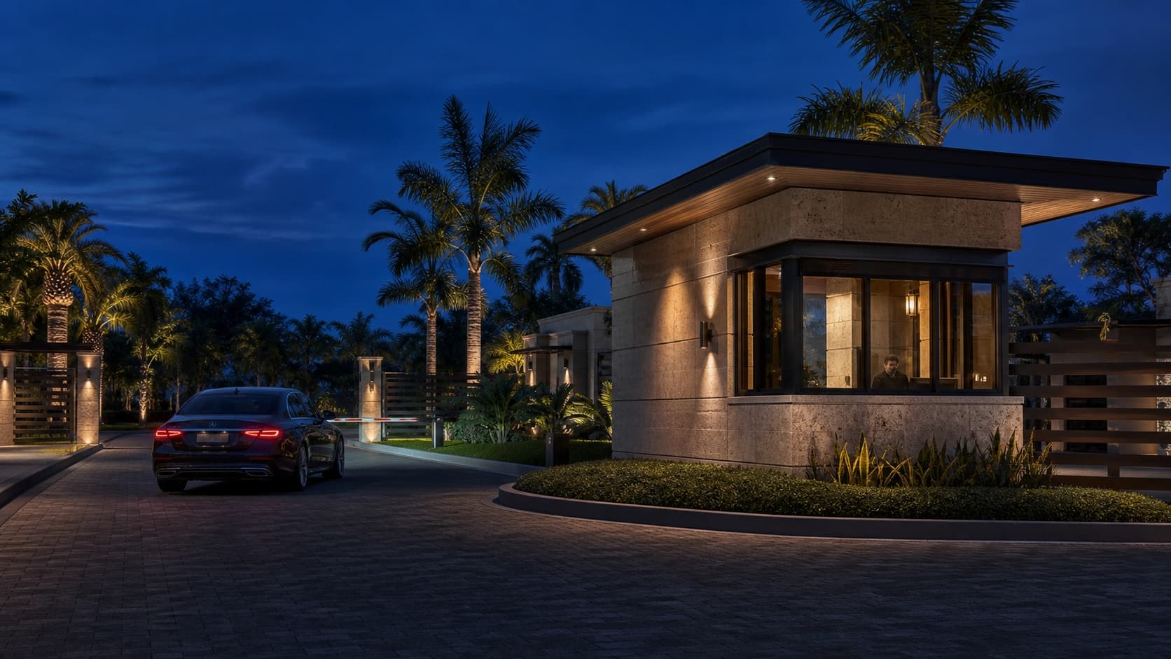 A vehicle arriving at a landscaped residential community entrance