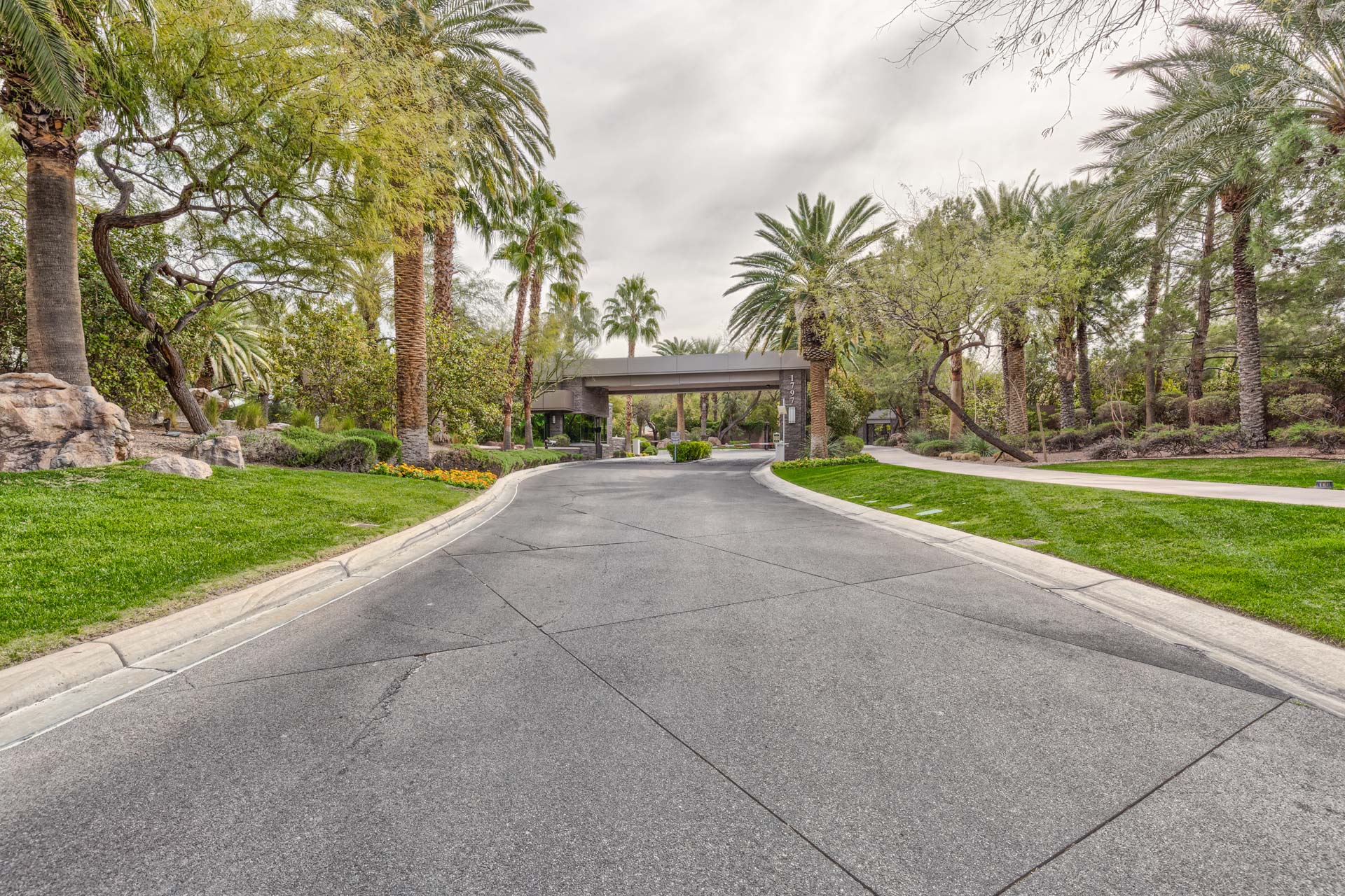A landscaped entryway into a residential community